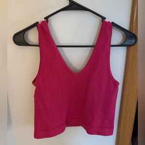 Hot pink cropped waffle knit tank top.